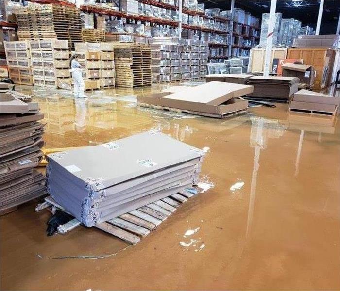 Flooded warehouse, black water damage