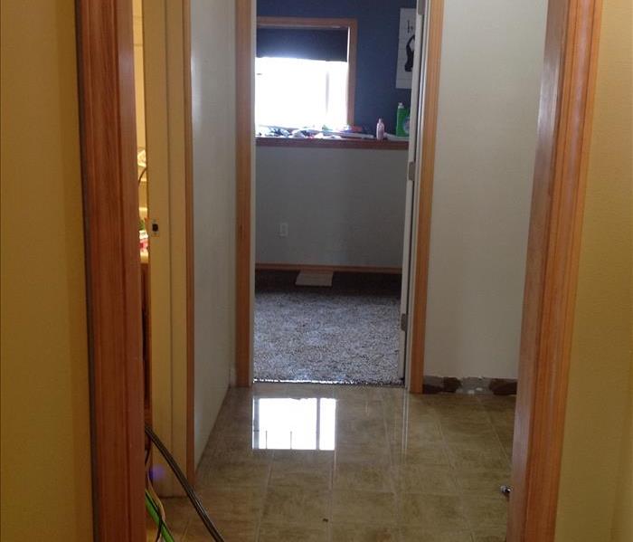 wet floor, water damage in a home